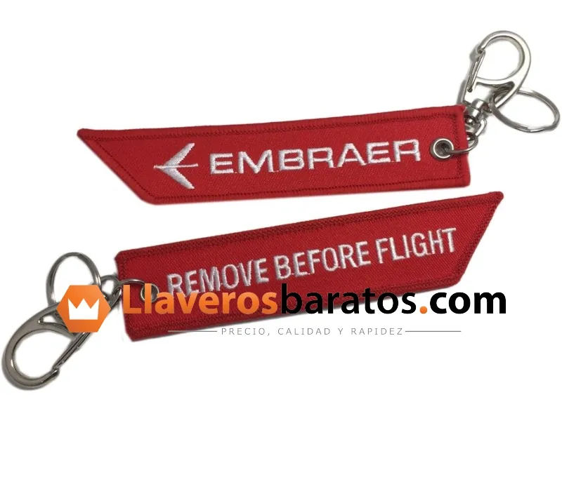 Llavero de tela bordado rojo con mosquetón y avión